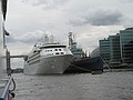 Silver Wind anchors next to HMS Belfast
