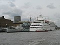 Silver Wind anchors next to HMS Belfast
