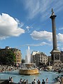 A fountain and Nelson's column at Trafalgar Square