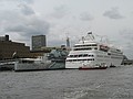 Silver Wind anchors next to HMS Belfast